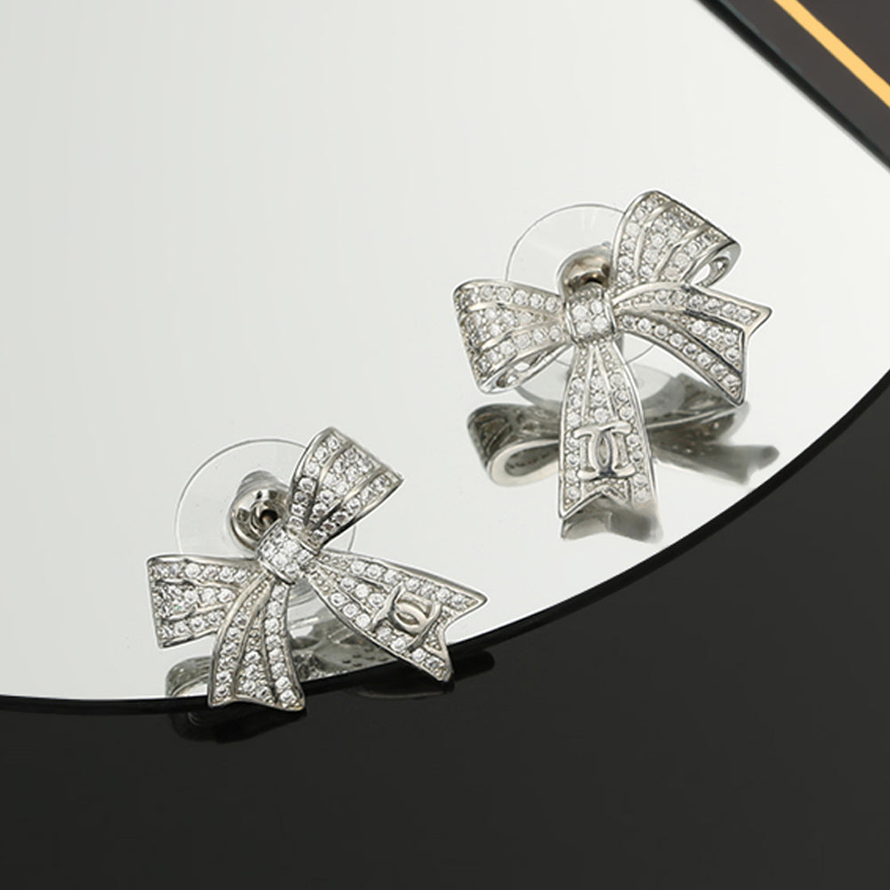 18K  Chanel Bow Tie Diamond Earrings